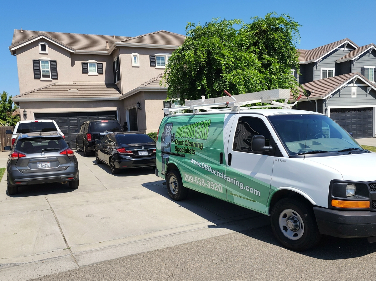 Dustbusters van parked at a Central Valley home on a service call